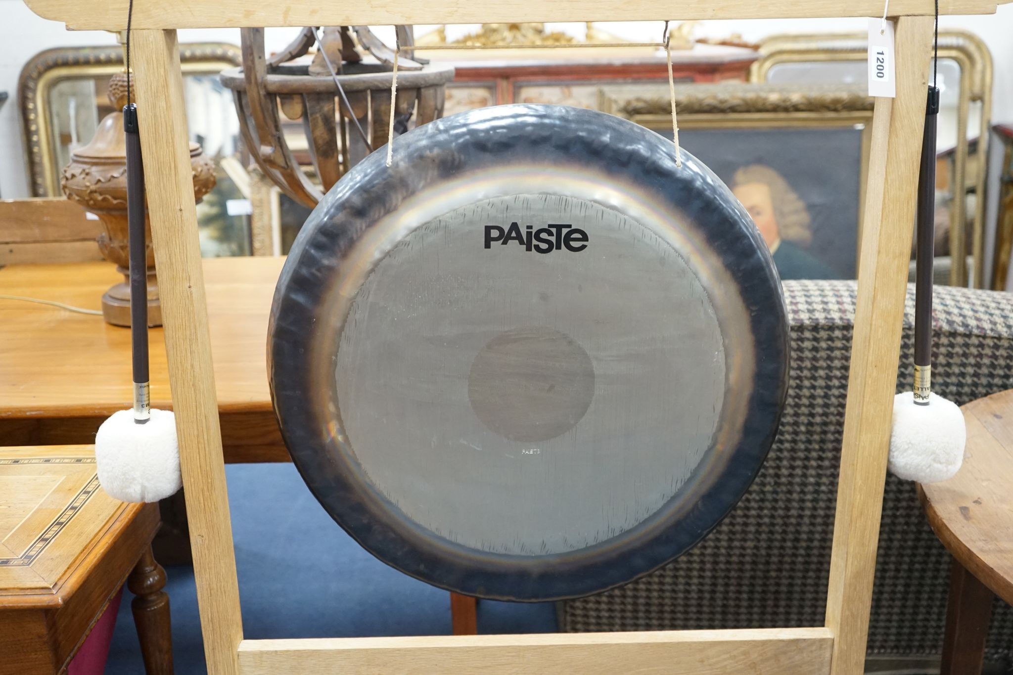 A Paiste 56cm. gong and a pair of Paiste M3 mallets, on purpose-made oak stand, stand height 124cm